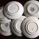 6 mismatched flat plates Terre de fer bleu Alésia Marcel Longchamp