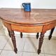 Half-moon table made of solid wood.