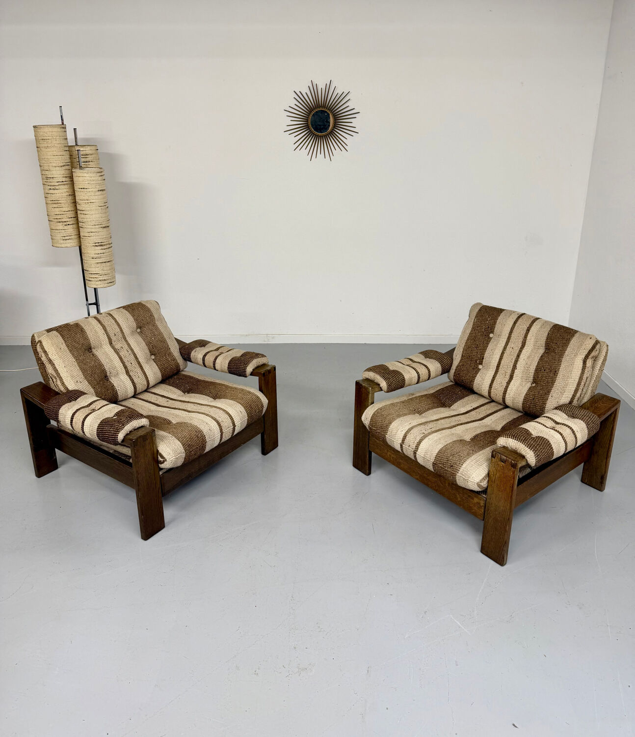 2 vintage 1970s wooden and fabric armchairs