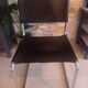 Paire de chaises en cuir noir et chrome modele Spoletto du designer Bersanelli