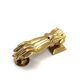 Brass door knocker in the shape of a hand, 1970s.