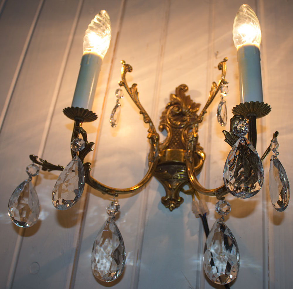Old brass sconce with glass drops