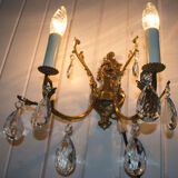 Old brass sconce with glass drops