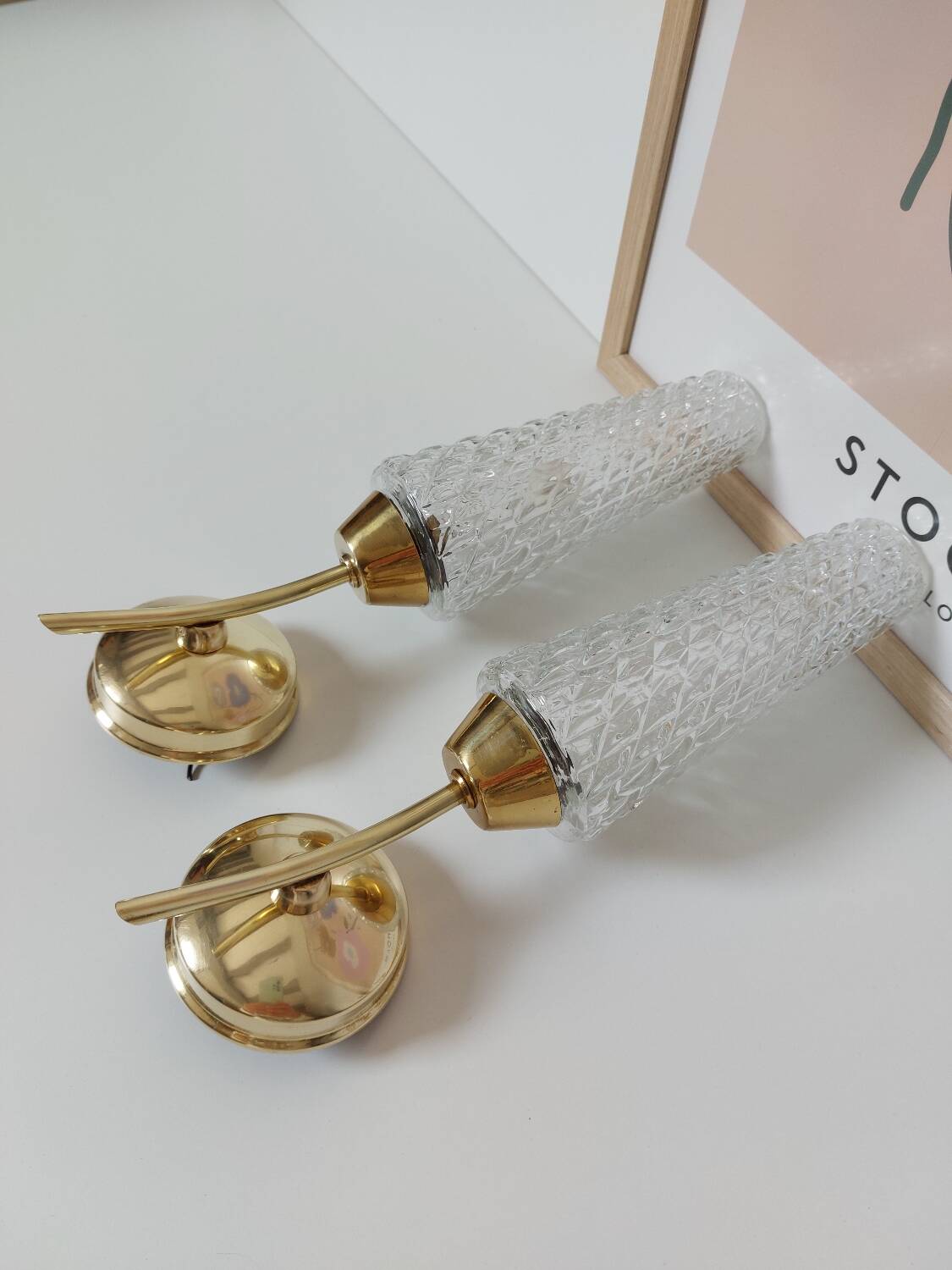 Pair of brass and glass wall lights