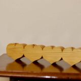 Heart-shaped chandelier made of Swedish pine wood.