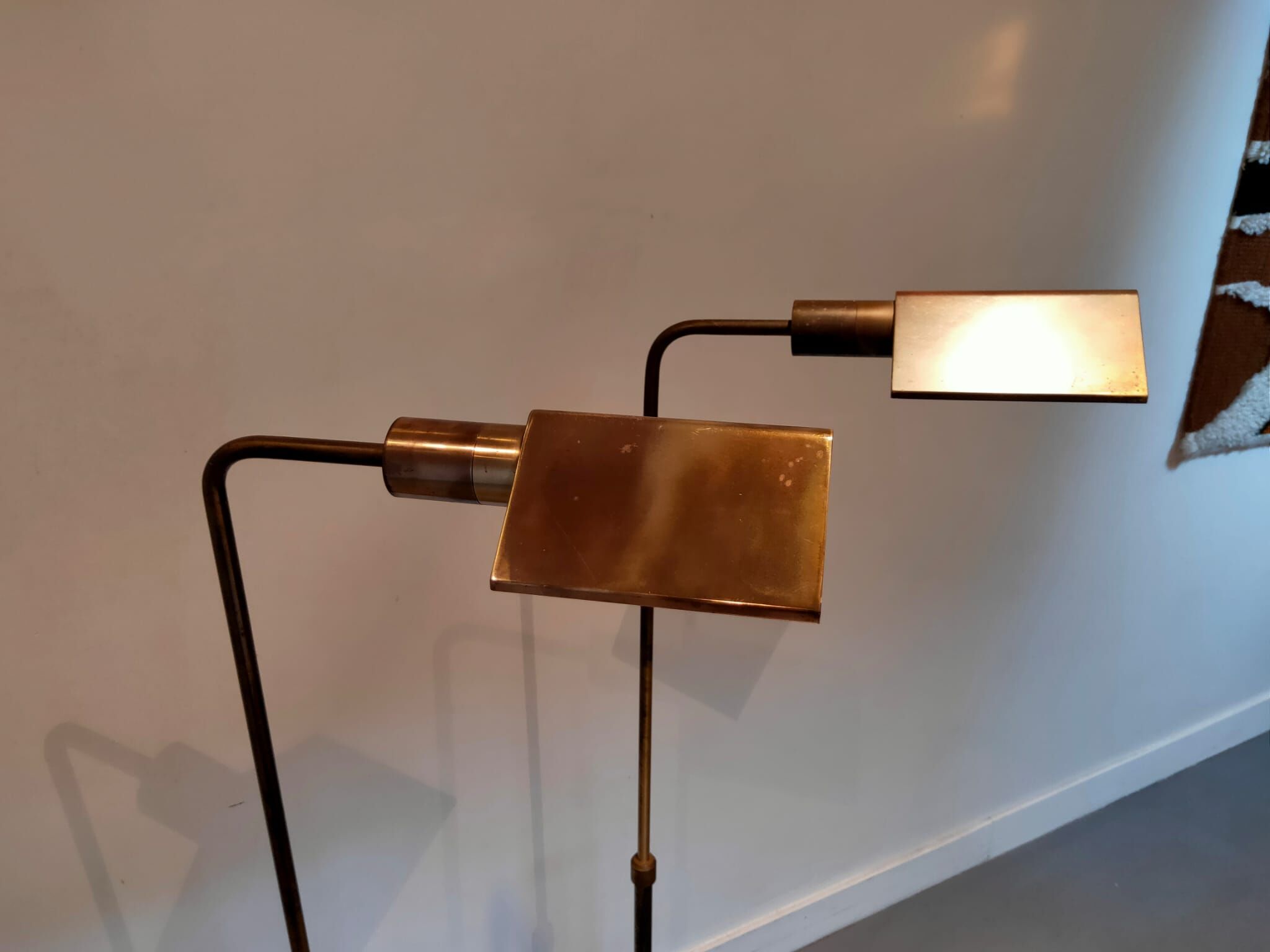 Two vintage brass lampposts