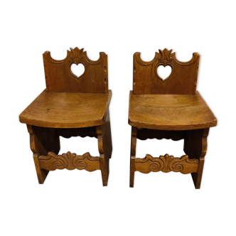 Pair of folk art carved oak chairs, 1900s