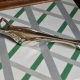 Décapsuleur vintage oie en vol en métal argenté