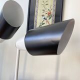 Pair of adjustable industrial metal wall sconces.