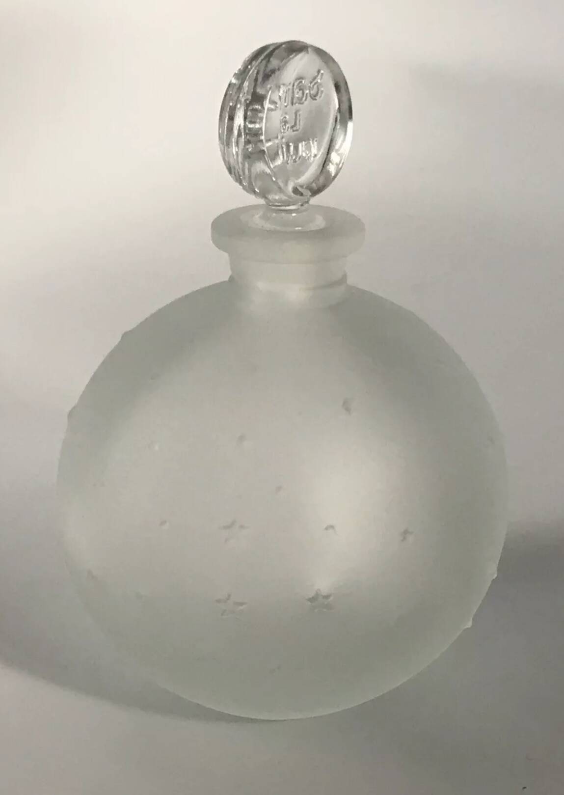 Lalique bottle in the night, frosted glass, ball shape