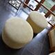 Pair of Art Deco armchairs and poufs