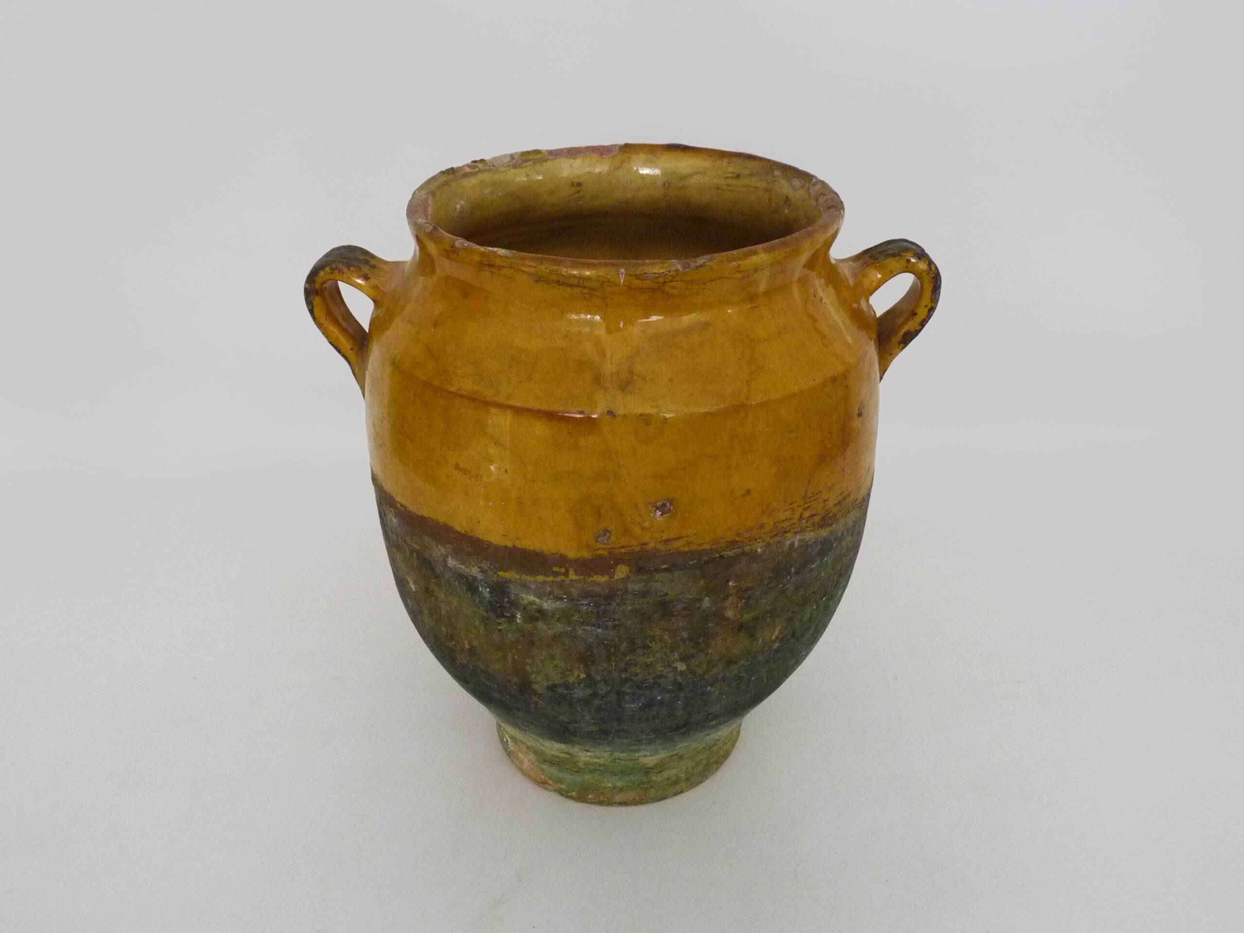 Magnificent glazed yellow confit pot, south-west of France. 19th century.