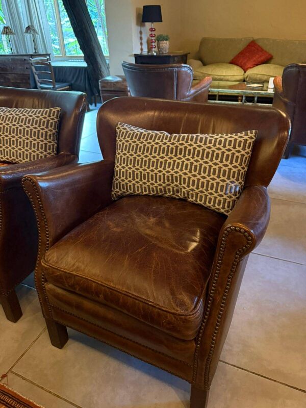 Fauteuil en cuir de vachette marron avec coussin assise réversible en Kilim