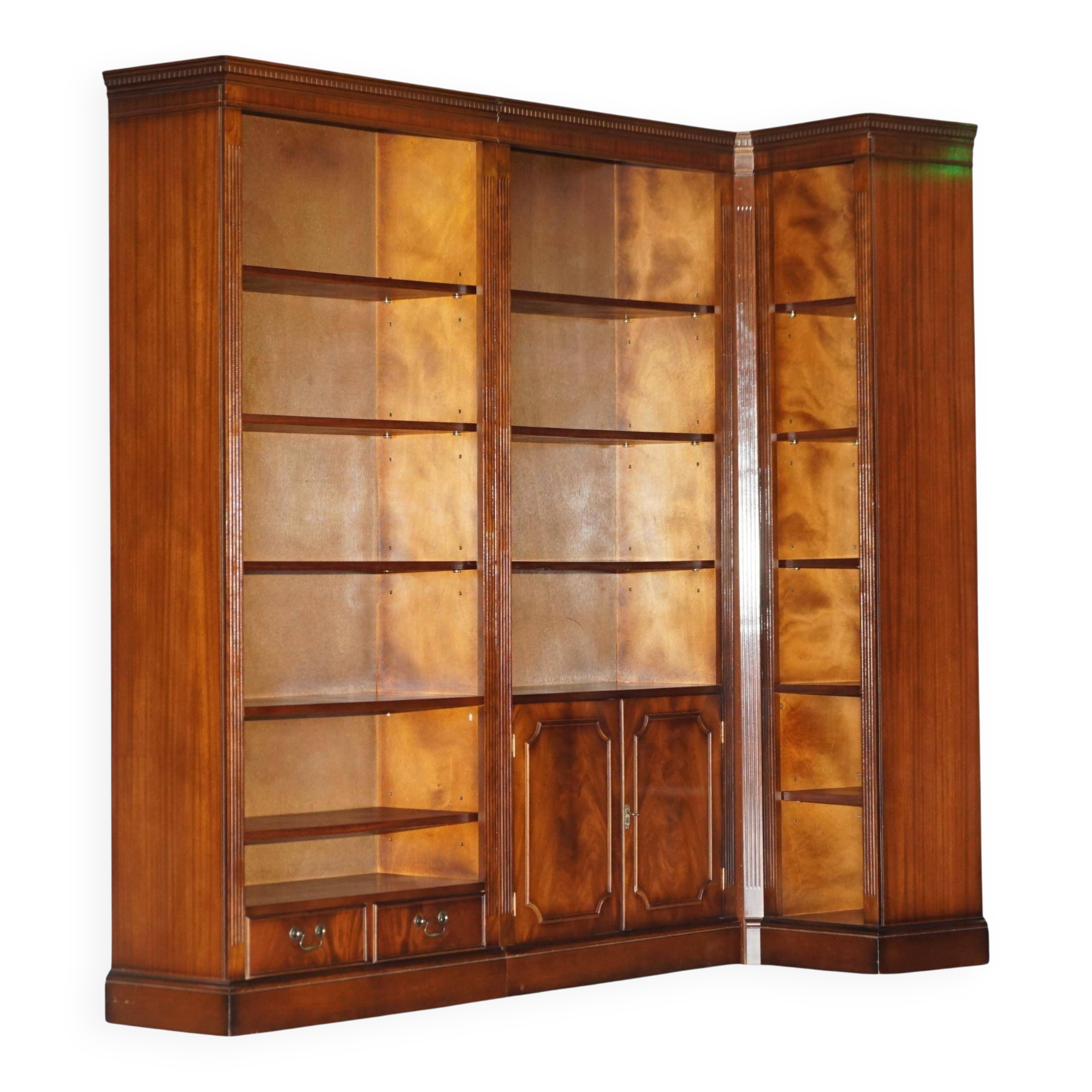 Corner library made of flamed hardwood, in 3 parts.
