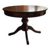 Table ronde a pied central en merisier massif