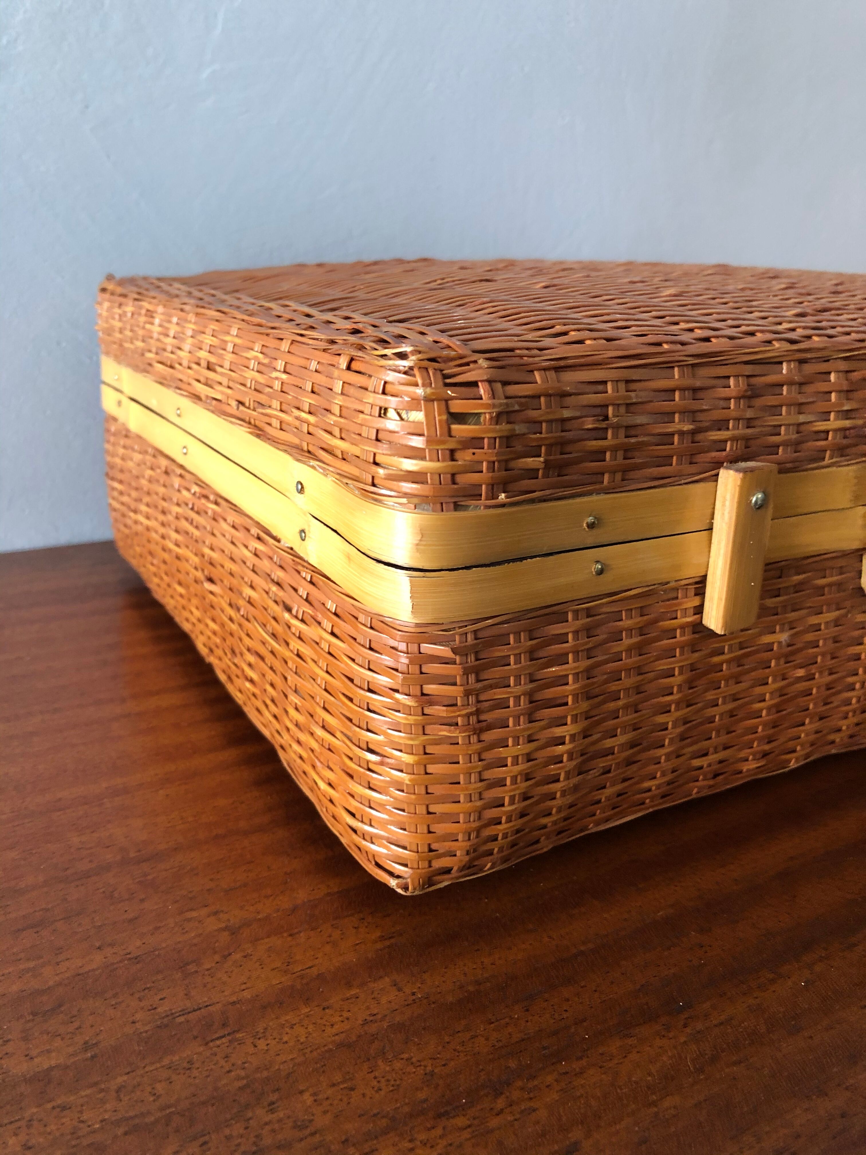 Vintage braided wicker suitcase