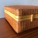 Vintage braided wicker suitcase