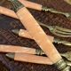 Dessert forks in brass and Bakelite in their case.