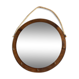 Vintage round wooden wall mirror with hooks