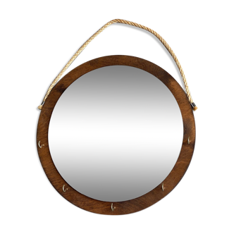 Vintage round wooden wall mirror with hooks