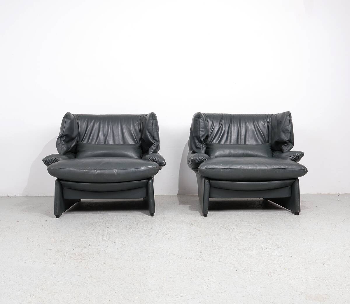 Cassina Portovenere set leather lounge chairs with ottoman