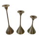 Set of three vintage brass candle holders
