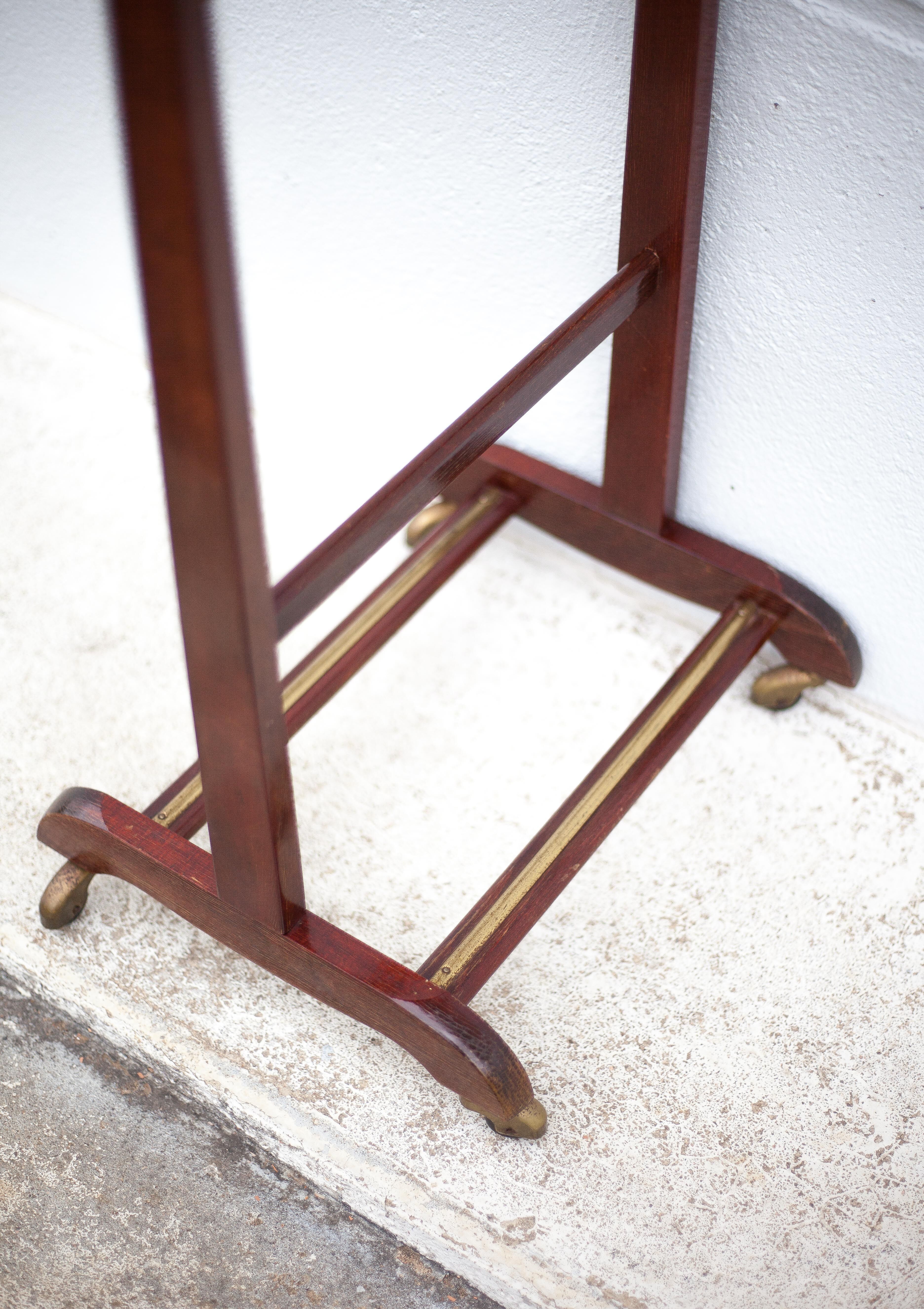 Wood and brass Reguitti valet