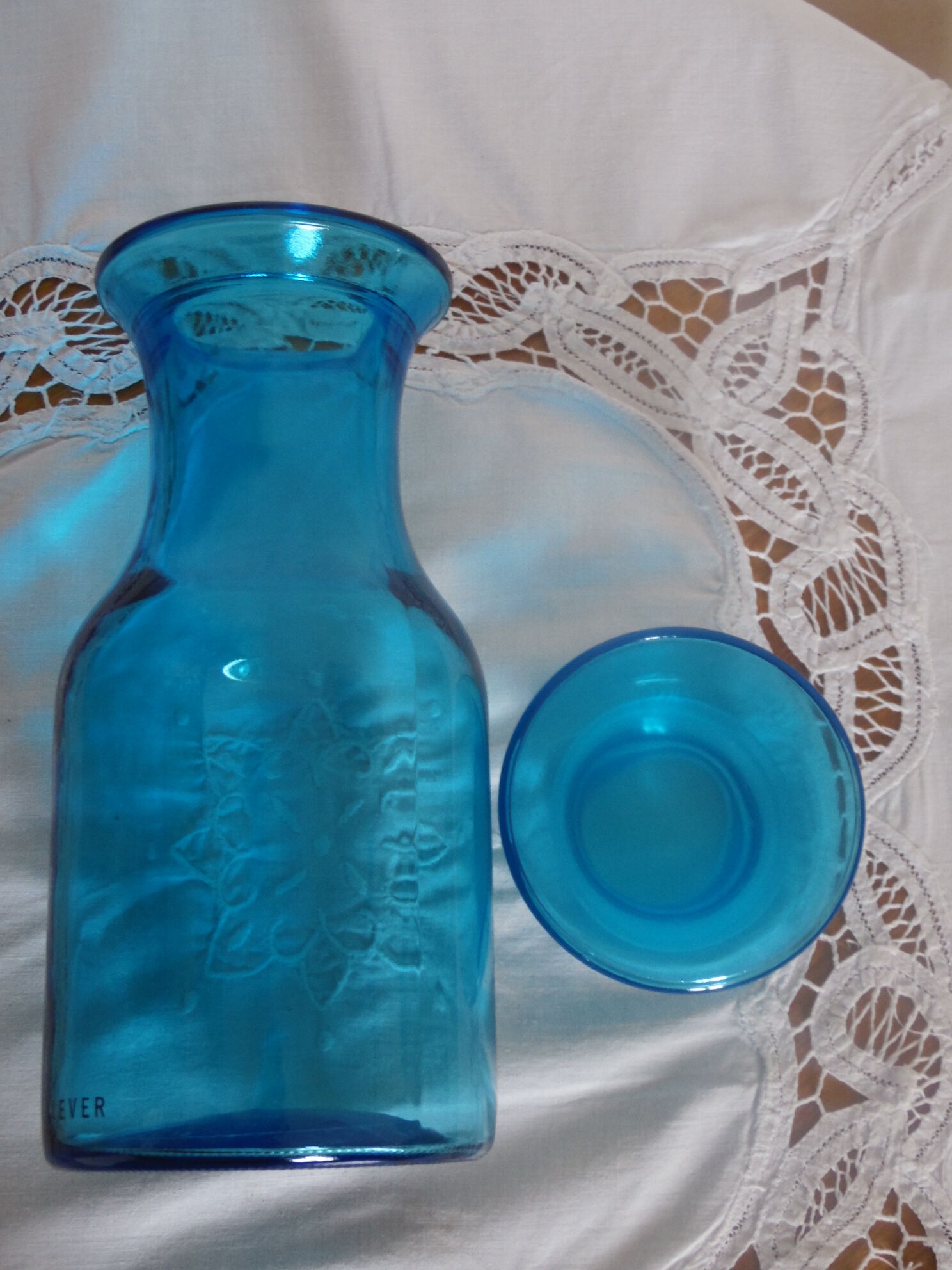 Large turquoise bottle lift 70's.