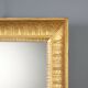 Antique Empire mirror in gilded wood, Italy, 19th century.