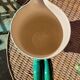 Green glazed ceramic pitcher