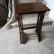 Stackable tables with pyrography.