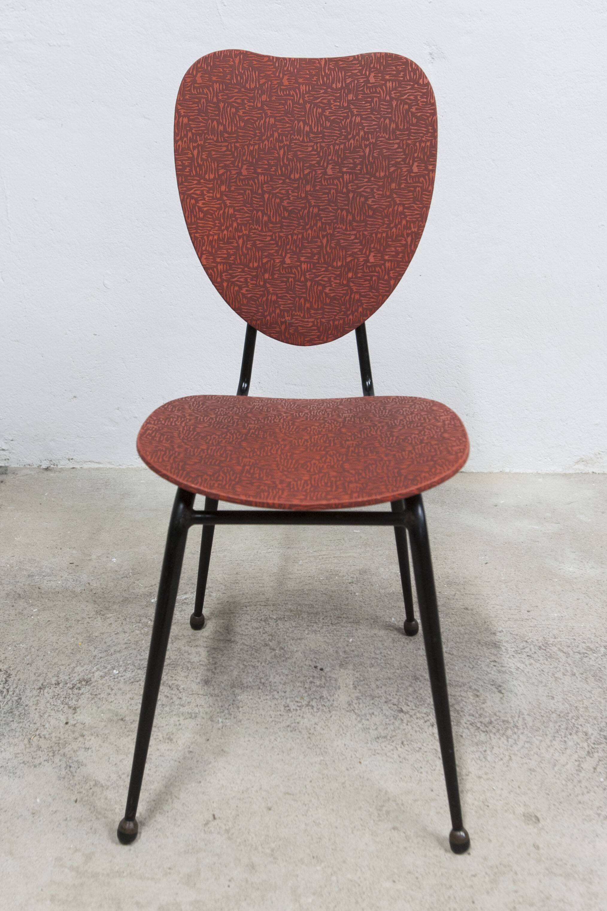 Vintage 70s chair in black lacquered metal and atypical red vinyl
