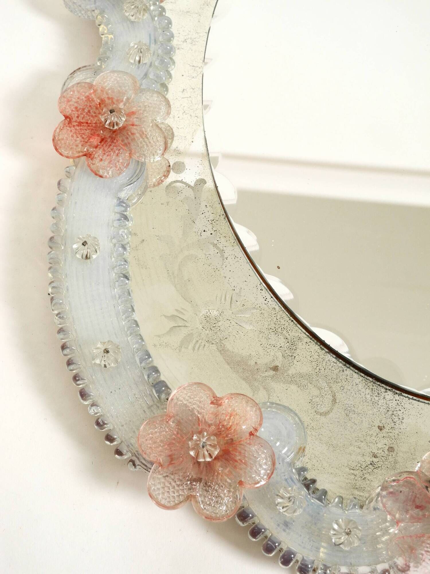 Italian mid-century wall mirror with a Murano glass frame and blossoms