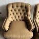 Pair of upholstered lounge chairs with ottoman, 1970s