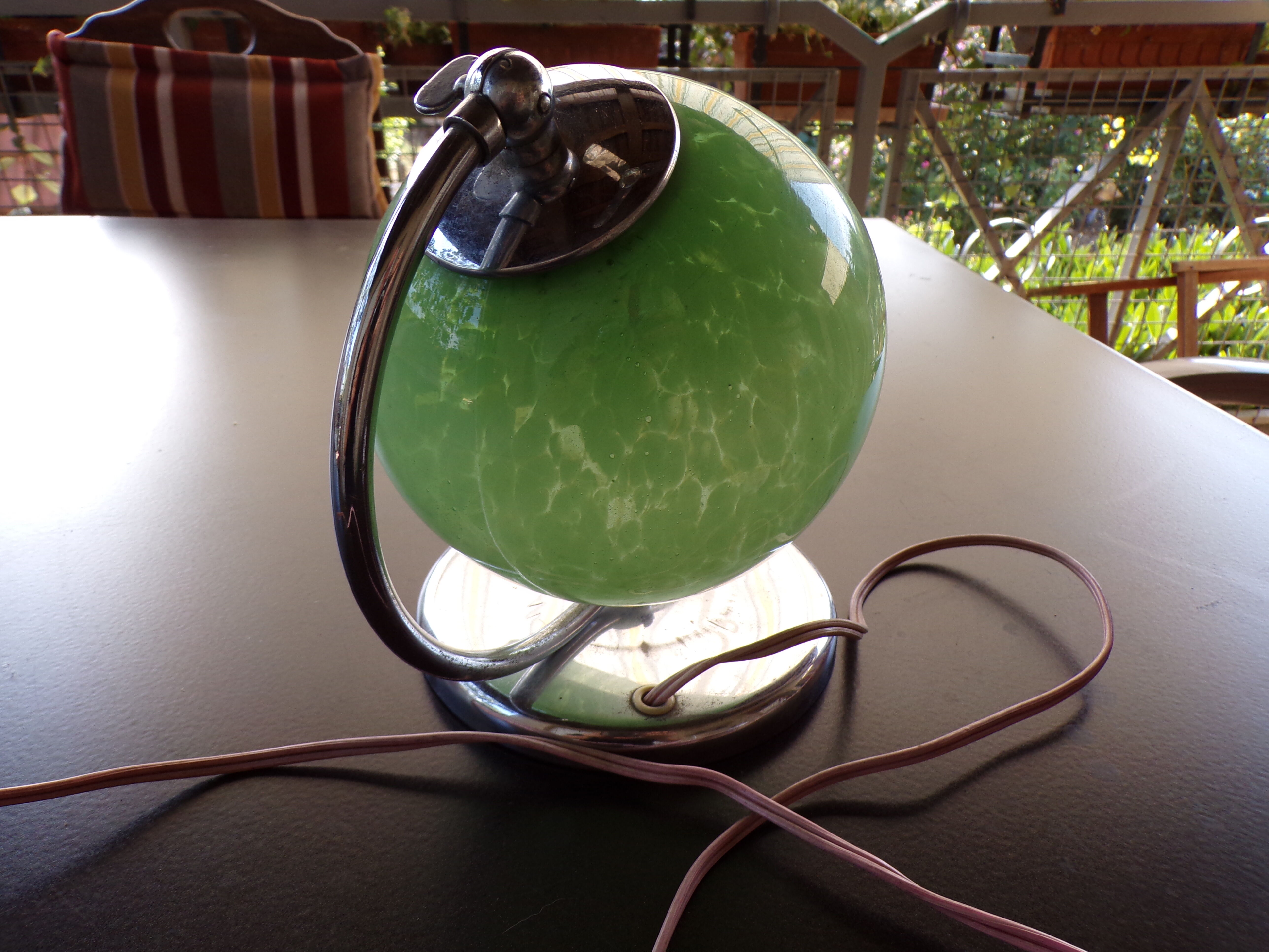 Art deco bedside lamp, chrome metal and speckled green glass globe