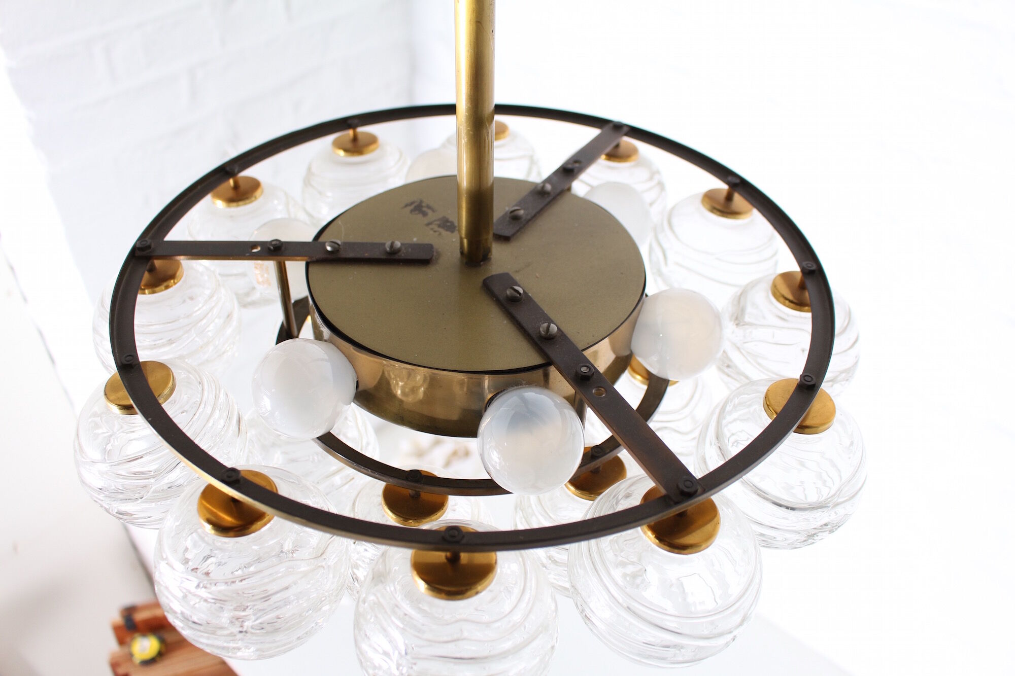 Brass chandelier and glass globes