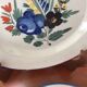 Set of 2 old painted terracotta plates enamelled