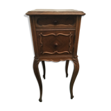 Louis Philippe beside table