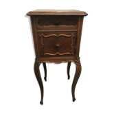 Louis Philippe beside table