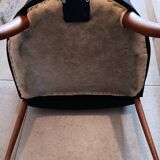 Pair of leather and wood armchairs in the Umberto Asnago style.