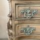 Commode arbalete baroque patinée
