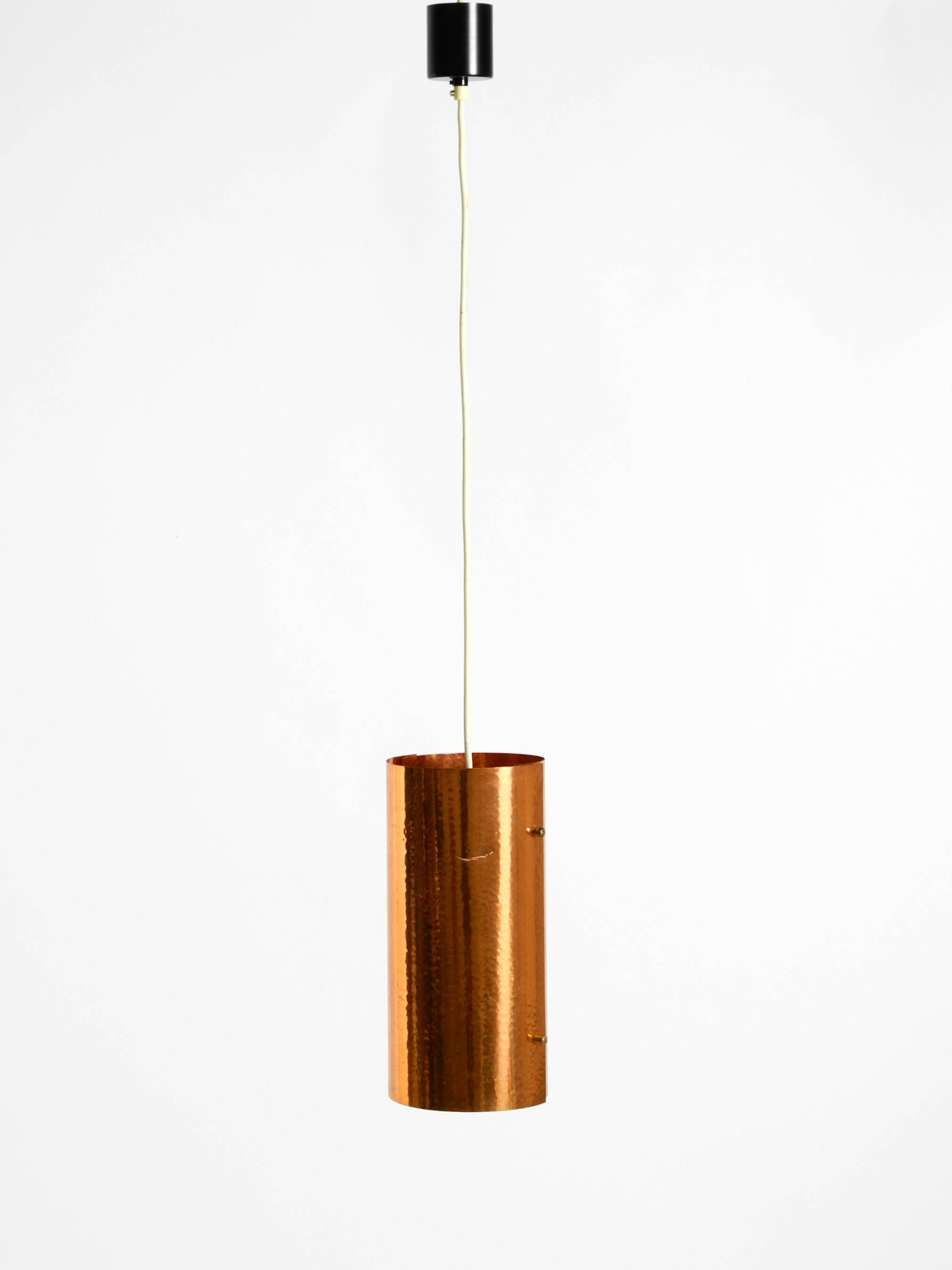 Two 50s tube pendant lamps consisting of two screwed-together copper bowls