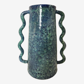 Blue-green ceramic vase with abstract wavy handles