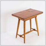 Vintage wooden side table with terracotta top