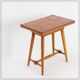 Vintage wooden side table with terracotta top