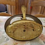 Old silver-plated bronze lamp, except for the arms which are not silver.