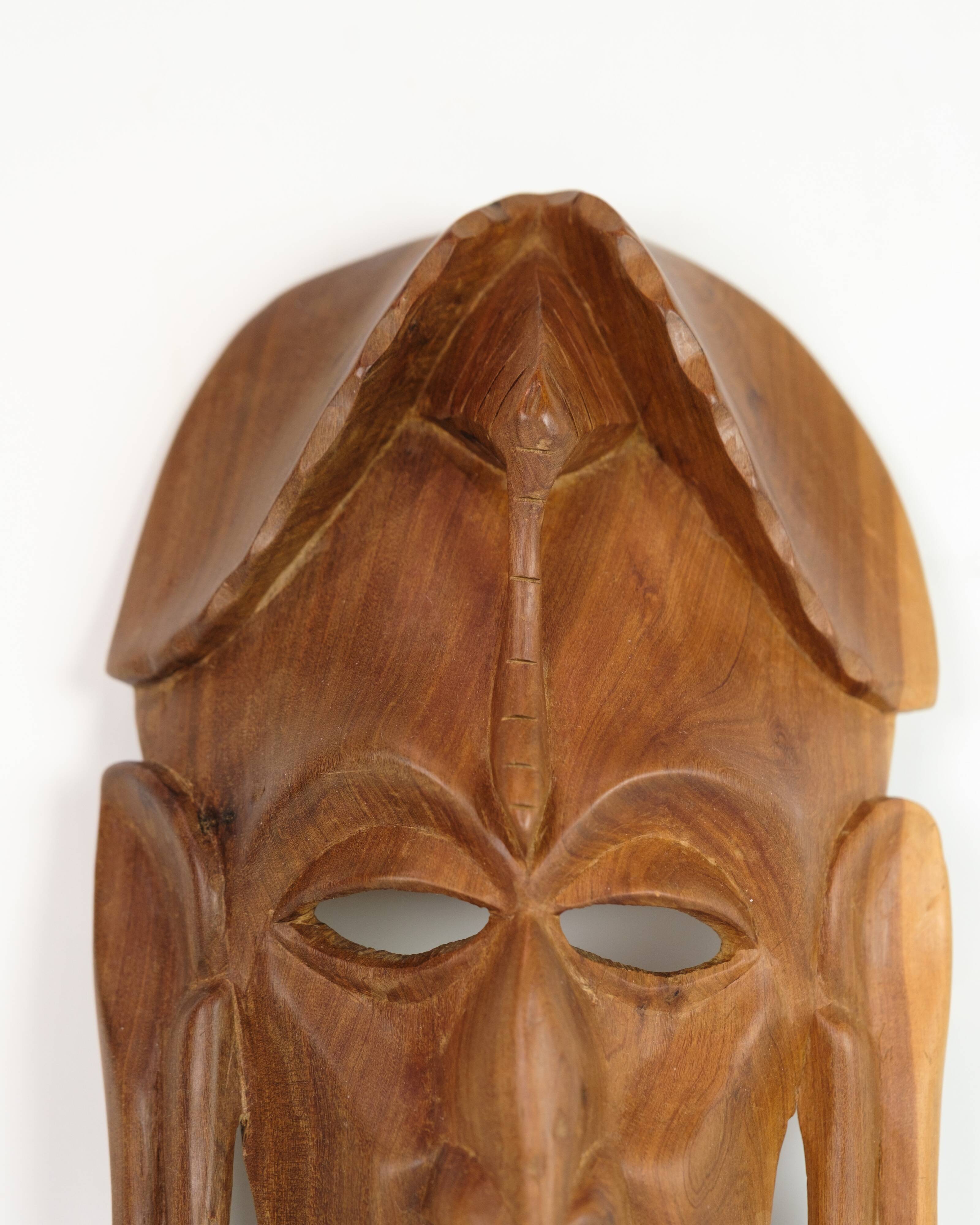 African Mask Hand Carved In Light Wood From West Africa