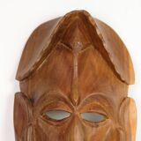 African Mask Hand Carved In Light Wood From West Africa