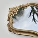 Ancien miroir mural en résine dorée style rococo