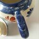 Henriot Quimper teapot – floral relief decoration